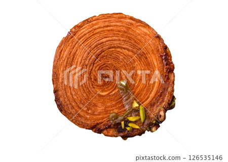 Round puff pastry croissant with pistachio filling or new york roll Round puff pastry croissant with pistachio filling or new york roll 126535146
