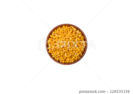 Sweet yellow canned corn in bowl 126535156