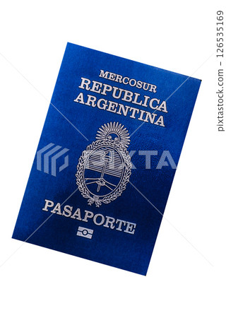 International passport of a citizen of Argentina on a suitcase 126535169