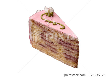 A piece of pink layered cake with strawberry flavor 126535175
