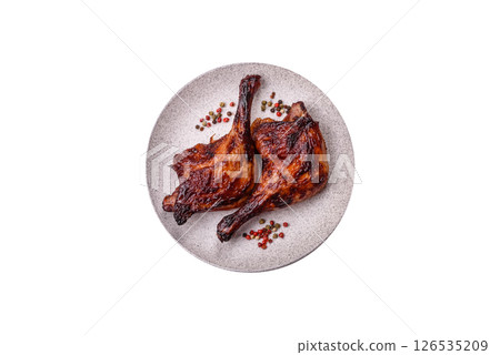 Duck, chicken leg or thigh grilled on a white background 126535209