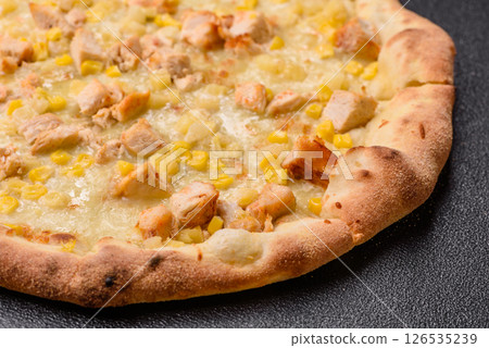 Hawaiian pizza with chicken, pineapple, corn and cheese Hawaiian pizza with chicken, pineapple, corn and cheese 126535239