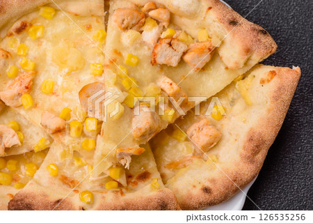 Hawaiian pizza with chicken, pineapple, corn and cheese Hawaiian pizza with chicken, pineapple, corn and cheese 126535256