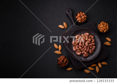 Cashew nuts in shell in bowl Cashew nuts in shell in bowl 126535335