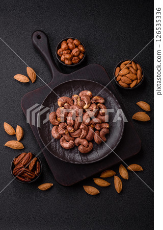 Cashew nuts in shell in bowl Cashew nuts in shell in bowl 126535336