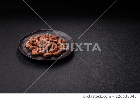 Cashew nuts in shell in bowl Cashew nuts in shell in bowl 126535345
