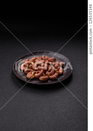 Cashew nuts in shell in bowl 126535348