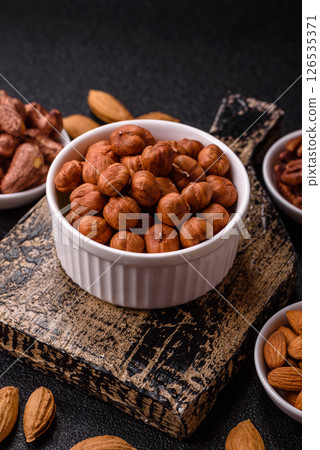 Raw hazelnuts without shells in a bowl Raw hazelnuts without shells in a bowl 126535371