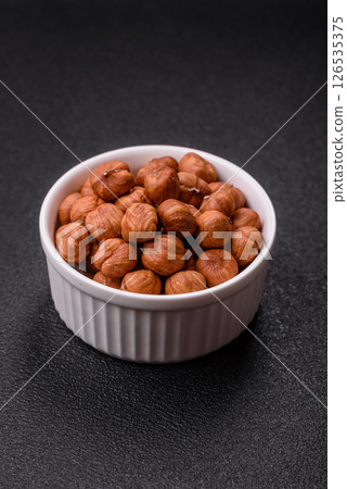 Raw hazelnuts without shells in a bowl Raw hazelnuts without shells in a bowl 126535375