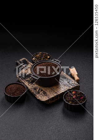 Black tea dry crushed in bowl Black tea dry crushed in bowl 126535450