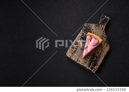 Sweet cheesecake with berry flavor, decorated with pink hearts 126535590