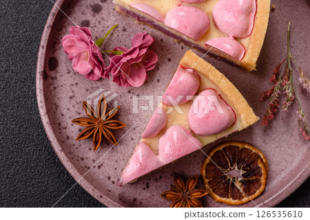 Sweet cheesecake with berry flavor, decorated with pink hearts 126535610