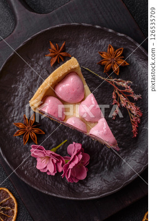 Sweet cheesecake with berry flavor, decorated with pink hearts Sweet cheesecake with berry flavor, decorated with pink hearts 126535709