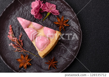 Sweet cheesecake with berry flavor, decorated with pink hearts 126535712