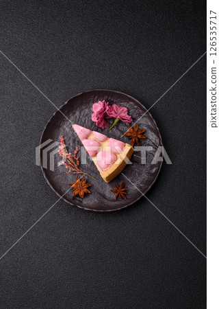 Sweet cheesecake with berry flavor, decorated with pink hearts Sweet cheesecake with berry flavor, decorated with pink hearts 126535717