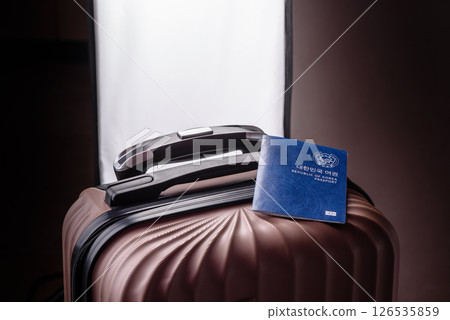 International passport of a citizen of South Korea on a suitcase 126535859