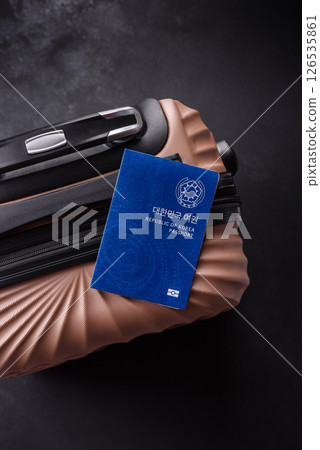 International passport of a citizen of South Korea on a suitcase 126535861