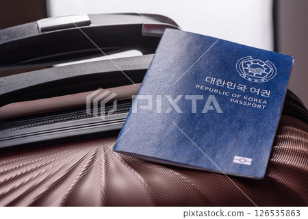 International passport of a citizen of South Korea on a suitcase 126535863