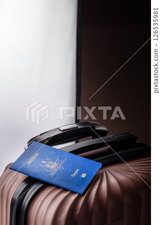International passport of a citizen of Australia on a suitcase 126535981