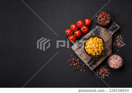 Sweet yellow canned corn in bowl 126536054