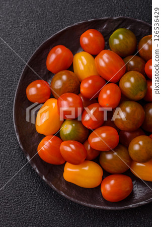 Tomatoes of different colors as a vegetable meal 126536429