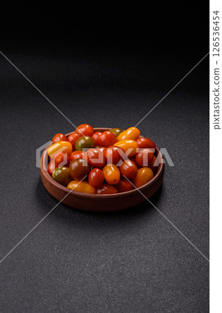 Tomatoes of different colors as a vegetable meal 126536454