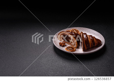 Sweet fresh crispy croissant with chocolate filling 126536857