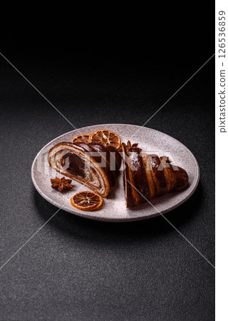 Sweet fresh crispy croissant with chocolate filling Sweet fresh crispy croissant with chocolate filling 126536859