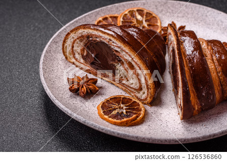 Sweet fresh crispy croissant with chocolate filling 126536860