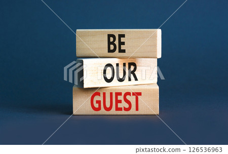 Be our guest symbol. Concept words Be our guest on beautiful wooden block. Beautiful grey table grey background. Business and be our guest concept. Copy space. Be our guest symbol. Concept words Be our guest on beautiful wooden block. Beautiful grey table grey background. Business and be our guest concept. Copy space. 126536963