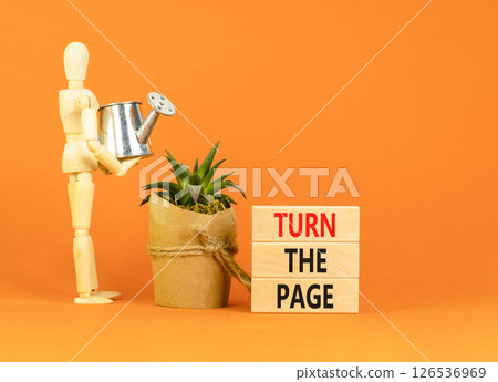Turn the page symbol. Concept words Turn the page on beautiful wooden block. Businessman model. Beautiful orange background. Business motivational lifestyle turn the page concept. Copy space. Turn the page symbol. Concept words Turn the page on beautiful wooden block. Businessman model. Beautiful orange background. Business motivational lifestyle turn the page concept. Copy space. 126536969