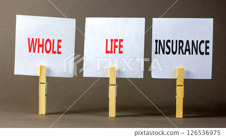 Whole life insurance symbol. Concept words Whole life insurance on beautiful white paper on clothespin. Beautiful grey background. Business whole life insurance concept. Copy space. 126536975