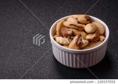 Brazil nut kernels in ceramic bowl 126537058