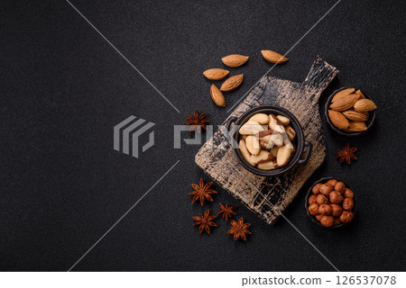 Brazil nut kernels in ceramic bowl 126537078