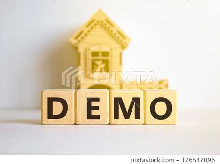 Demo symbol. Concept word Demo on beautiful wooden blocks. Beautiful white table white background. Wooden beautiful house. Business and demo concept. Copy space. 126537096