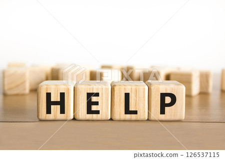 Help symbol. Concept word Help on beautiful wooden blocks. Beautiful wooden table white background. Business, lifestyle, support and help concept. Copy space. Help symbol. Concept word Help on beautiful wooden blocks. Beautiful wooden table white background. Business, lifestyle, support and help concept. Copy space. 126537115