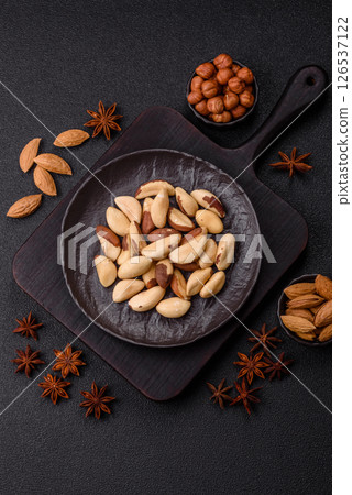 Brazil nut kernels in ceramic bowl 126537122