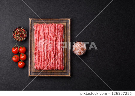 Raw ground beef or pork with salt and spices 126537235