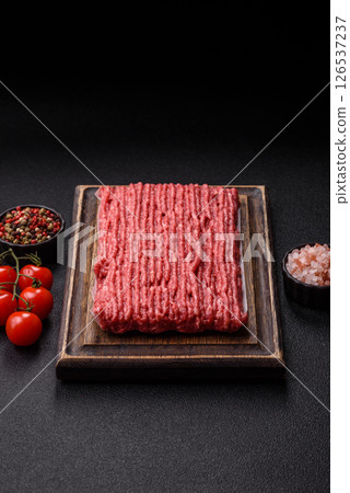 Raw ground beef or pork with salt and spices 126537237