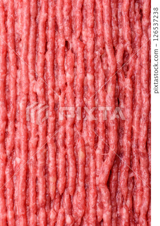 Raw ground beef or pork with salt and spices Raw ground beef or pork with salt and spices 126537238