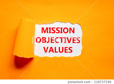 Mission objectives values symbol. Concept words Mission Objectives Values on beautiful white paper. Beautiful orange table orange background. Business mission objectives values concept. Copy space. Mission objectives values symbol. Concept words Mission Objectives Values on beautiful white paper. Beautiful orange table orange background. Business mission objectives values concept. Copy space. 126537298