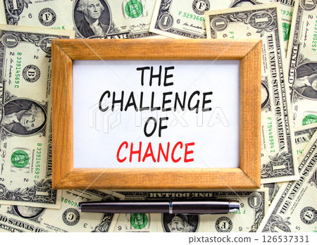 The challenge of chance symbol. Concept words phrase The challenge of chance on beautiful paper. Dollar bills. Beautiful dollar bills background. Business The challenge of chance concept. Copy space. 126537331