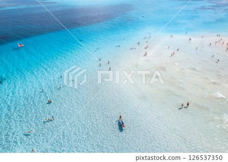 Aerial view of amazing sea coast. Top view of white sandy beach Aerial view of amazing sea coast. Top view of white sandy beach 126537350