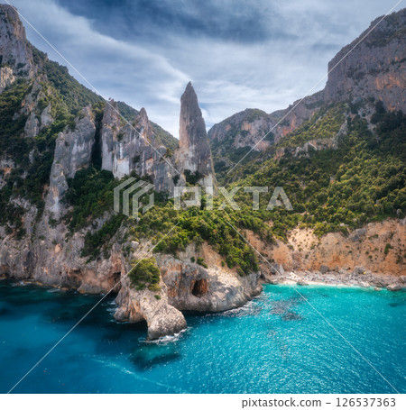 Aerial view of rocks and mountains, blue bay, beach, boats Aerial view of rocks and mountains, blue bay, beach, boats 126537363