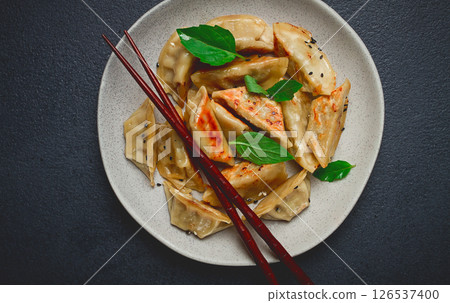 japanese fried dumplings, gyoza, sesame seeds, top view, no people, 126537400