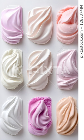 An elegant composition featuring nine swirled cream textures in various pastel shades arranged in a grid pattern against a white background. The image showcases different cosmetic. An elegant composition featuring nine swirled cream textures in various pastel shades arranged in a grid pattern against a white background. The image showcases different cosmetic. 126537494