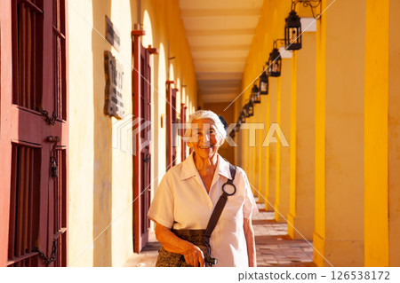 Senior woman tourist in Cartagena de Indias. Active senior concept. Senior lifestyle concept. Senior woman tourist in Cartagena de Indias. Active senior concept. Senior lifestyle concept. 126538172
