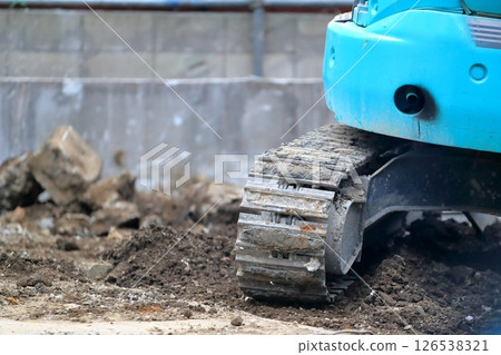 Small heavy machinery at a building demolition site Small heavy machinery at a building demolition site 126538321