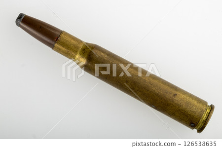 Old Rifle Cartridge on White Background Old Rifle Cartridge on White Background 126538635