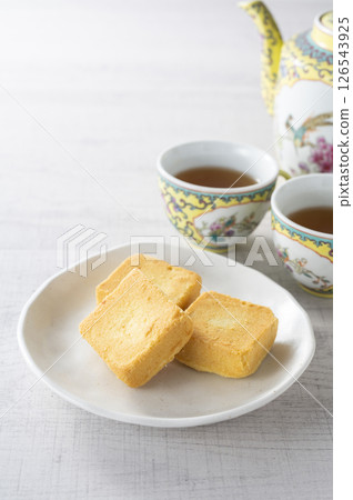 Tea time with pineapple cake 126543925